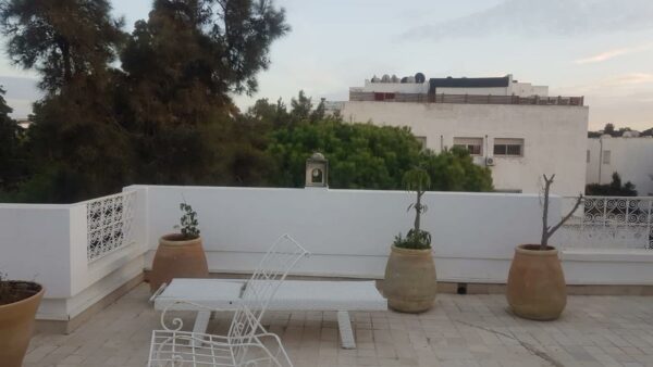 Opportunité spacieux triplex S5 avec jardin parking a vendre sur Gammarth résidence