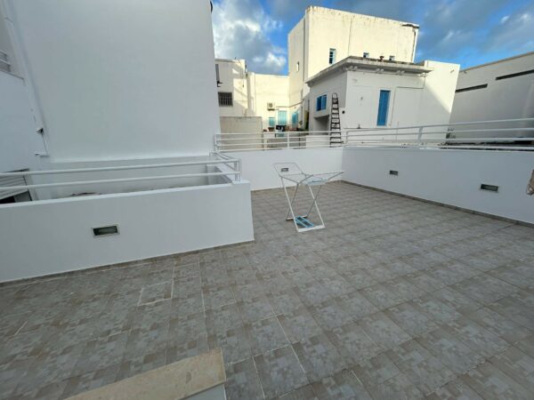 Marsa Plage bel immeuble bien situé avec duplex et appartement a vendre